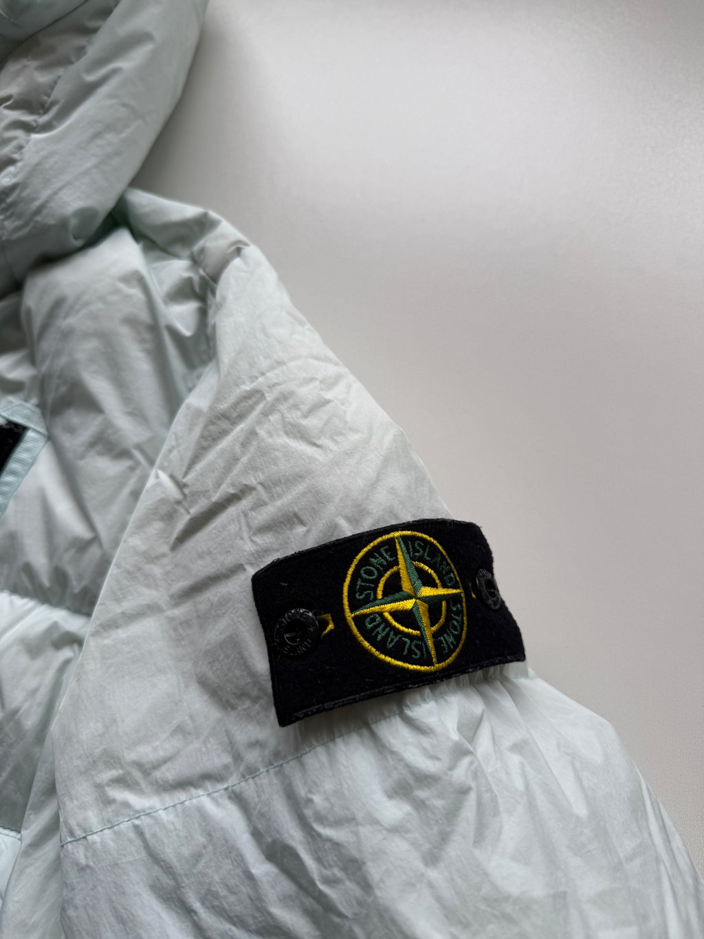 Stone island garment dyed crinkle reps down parka jacket